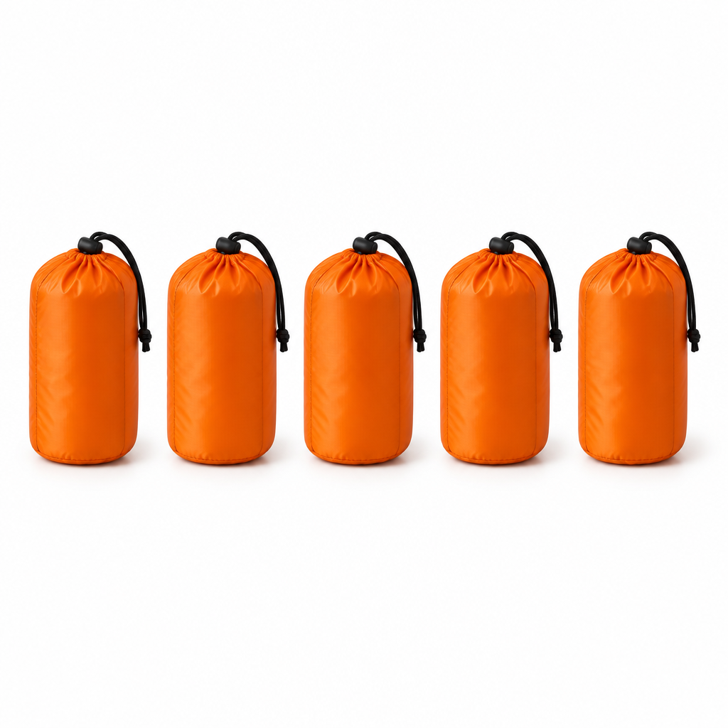 Five THERMA-X1 bivvies packed in their stuff sacks, one per person